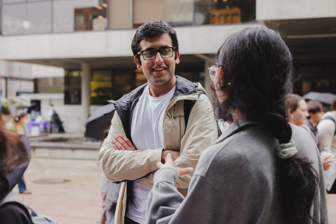Two students talking outside on the University of Ottawa campus